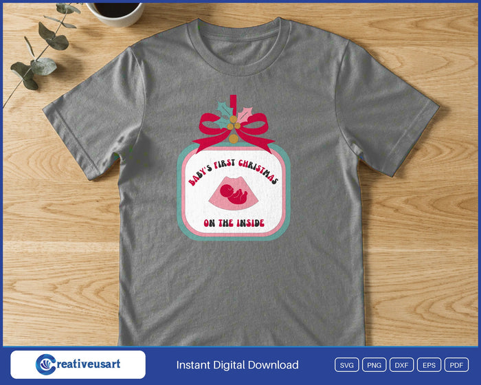 Baby's First Christmas On The Inside ultrasound ornament pregnancy announcement SVG printed on a grey t-shirt, for a mom-to-be sharing the news at Christmas