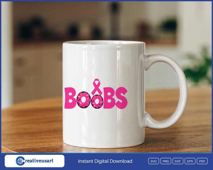 Boobs spelled with two sprinkled pink donuts and a pink ribbon, breast cancer awareness design on a white coffee mug