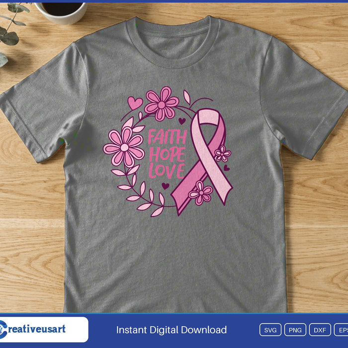 A pink awareness ribbon inside a floral wreath with the words Faith Hope Love, on a gray t-shirt