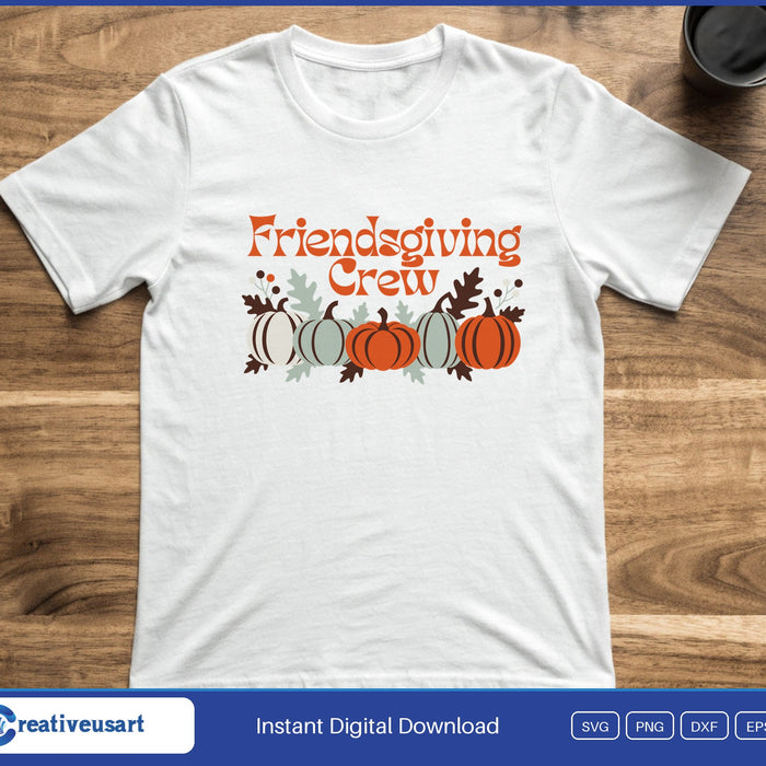 Five pumpkins in fall colors with leaves under the words Friendsgiving Crew, on a white t-shirt