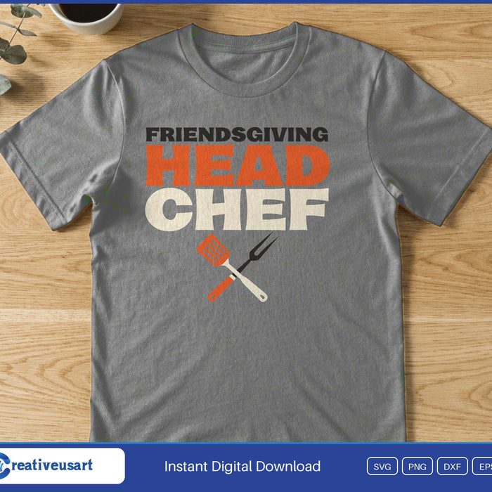 The words Friendsgiving Head Chef above a crossed spatula and carving fork, on a gray t-shirt