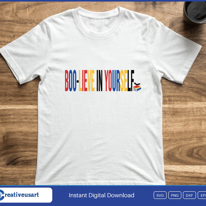 Halloween Counselor with Boo-lieve In Yourself and a small stack of books SVG printed on a white t-shirt