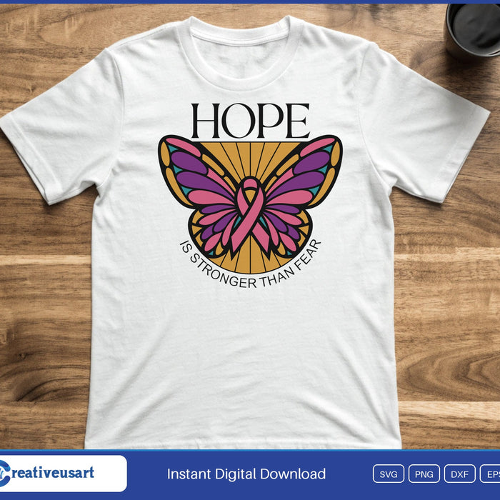 A purple and pink butterfly with a pink ribbon body, between the words Hope and Is Stronger Than Fear, on a white t-shirt
