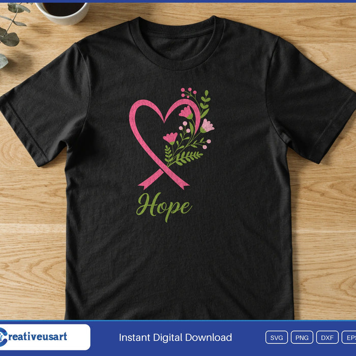 A pink ribbon curving into a heart with small flowers, above the word Hope, on a black t-shirt