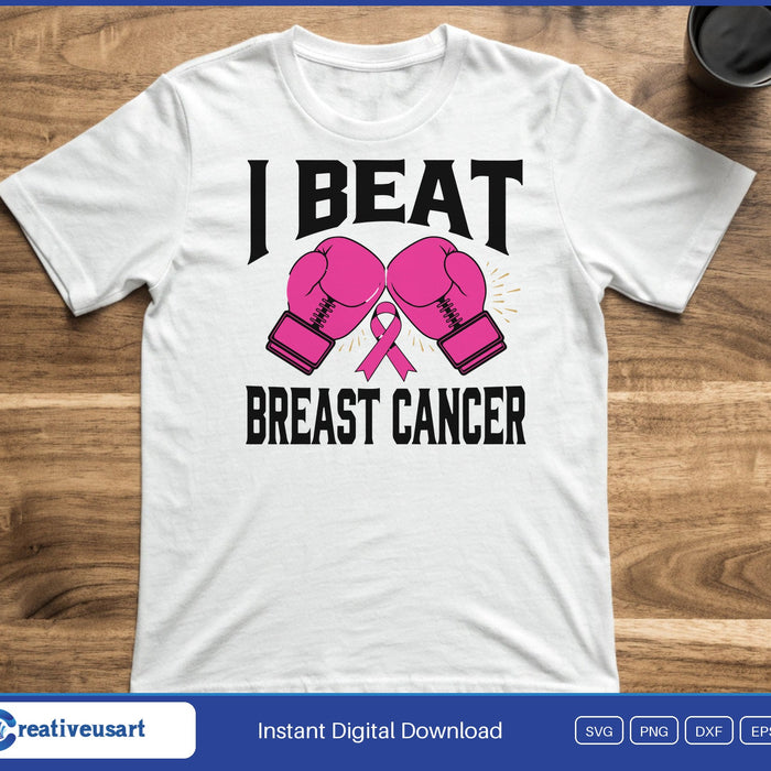 Pink boxing gloves with a pink ribbon, between the words I Beat and Breast Cancer, on a white t-shirt