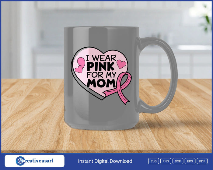 I Wear Pink For My Mom bold heart SVG design on a black coffee mug