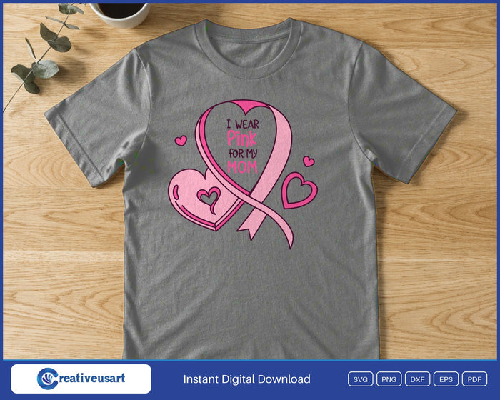 A pink ribbon looping into a heart with small hearts around it, holding the words I Wear Pink For My Mom, on a gray t-shirt