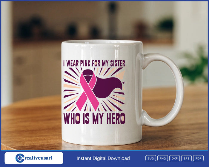 I Wear Pink For My Sister Who Is My Hero with a caped pink ribbon on a sunburst design on a white coffee mug