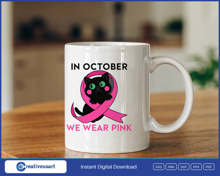 In October We Wear Pink black cat in a pink ribbon SVG design on a white coffee mug