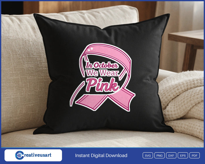 In October We Wear Pink script ribbon SVG design on a black throw pillow