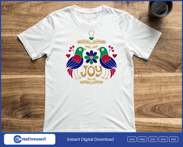 Joy folk art Christmas ornament birds SVG printed on a white t-shirt