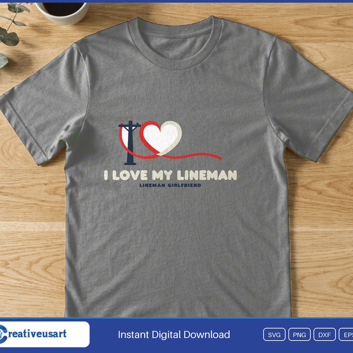 A utility pole and a heart above the words I Love My Lineman, on a gray t-shirt