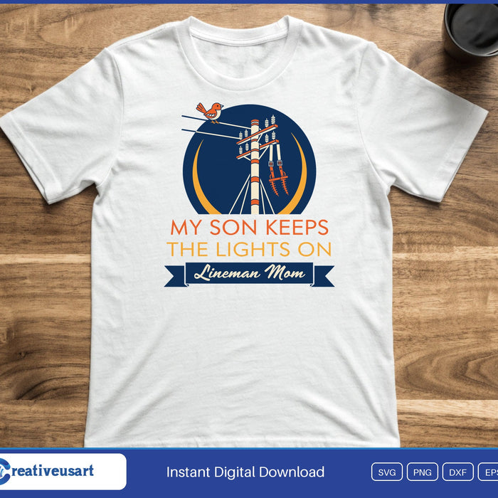 A power pole and bird in a navy circle above the words My Son Keeps The Lights On, Lineman Mom, on a white t-shirt