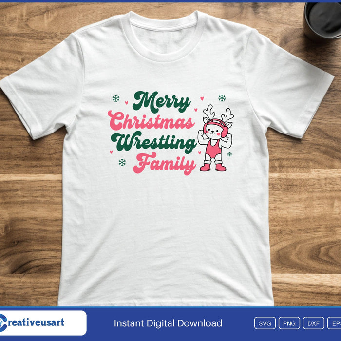 A reindeer in a red singlet and headgear flexing beside the words Merry Christmas Wrestling Family, on a white t-shirt