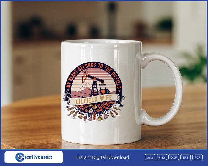 Oilfield Wife pump jack sunrise emblem with wildflowers SVG design on a white coffee mug