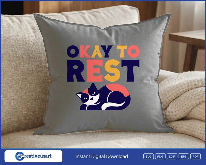 Okay To Rest sleeping cat SVG design on a grey throw pillow