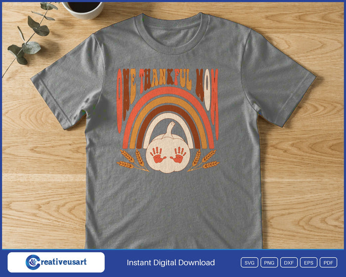 One Thankful Mom retro rainbow with a pumpkin and handprints SVG printed on a gray t-shirt