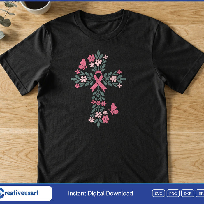 A cross made of pink flowers and green leaves with a pink ribbon at the center and two butterflies, on a black t-shirt
