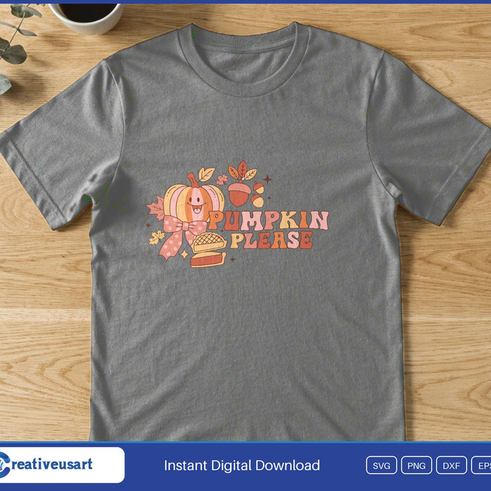 A pumpkin, a slice of pumpkin pie, an acorn and fall leaves beside the words Pumpkin Please, on a gray t-shirt