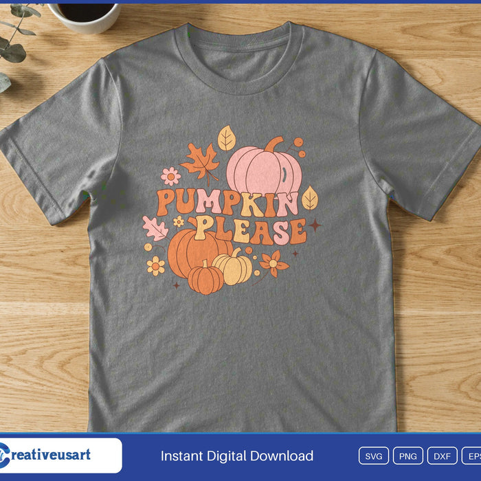 A pile of orange and pink pumpkins with fall leaves and flowers around the words Pumpkin Please, on a gray t-shirt