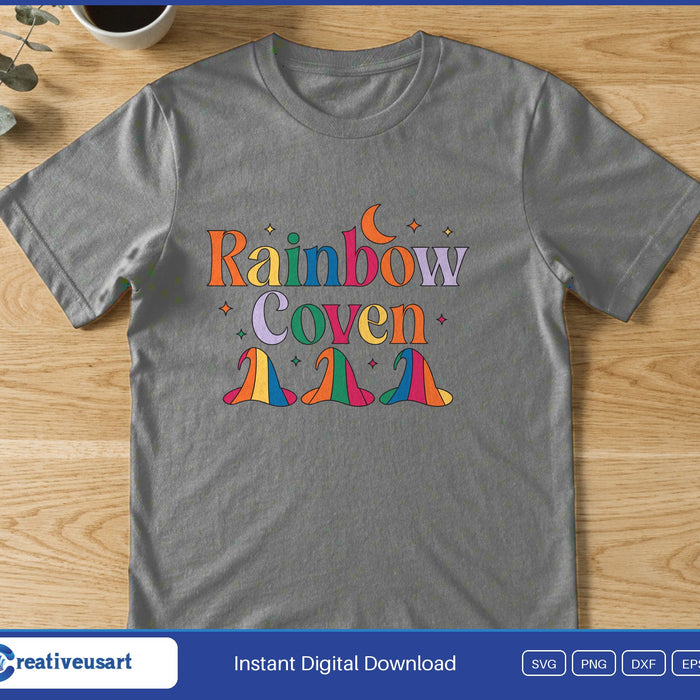 Three rainbow striped witch hats under the words Rainbow Coven with a crescent moon, on a gray t-shirt