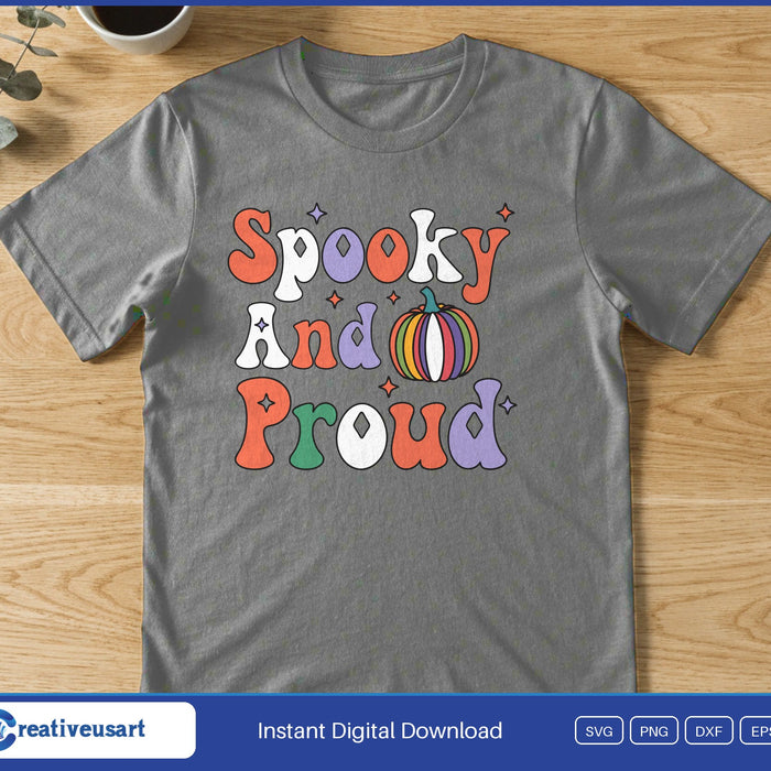 The words Spooky And Proud in retro rainbow letters with a rainbow striped pumpkin, on a gray t-shirt
