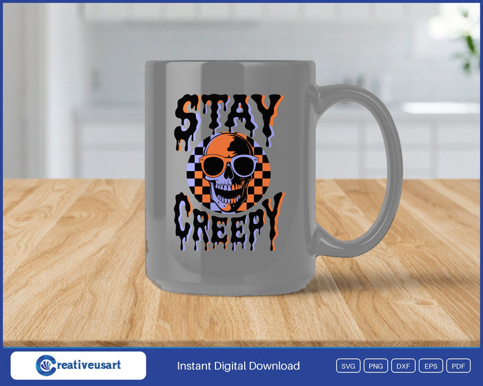 Stay Creepy skull in sunglasses Halloween SVG design on a white coffee mug