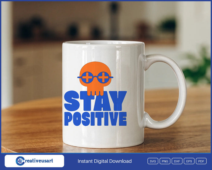 Stay Positive skull SVG design on a mug
