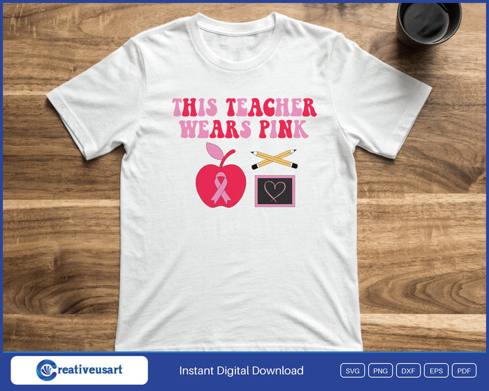 This Teacher Wears Pink breast cancer awareness apple ribbon SVG printed on a white t-shirt, a gift for a teacher in October