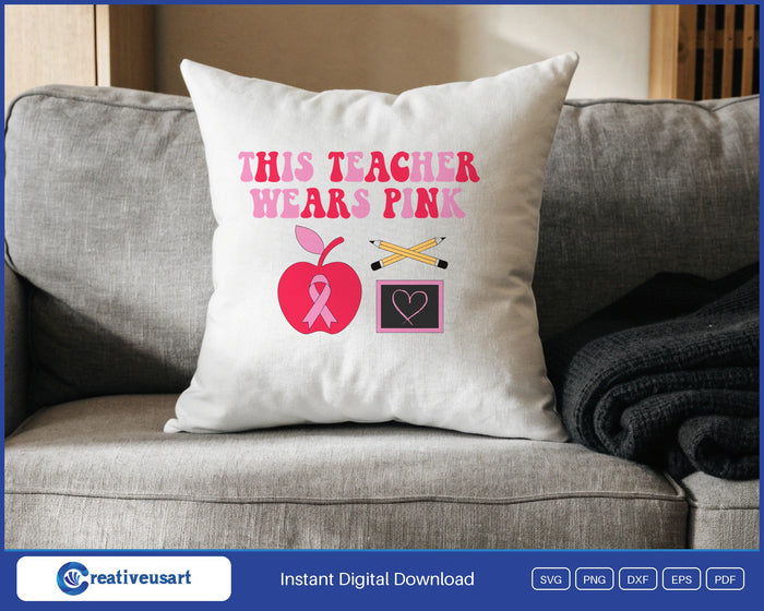 This Teacher Wears Pink breast cancer awareness apple ribbon SVG design on a white throw pillow